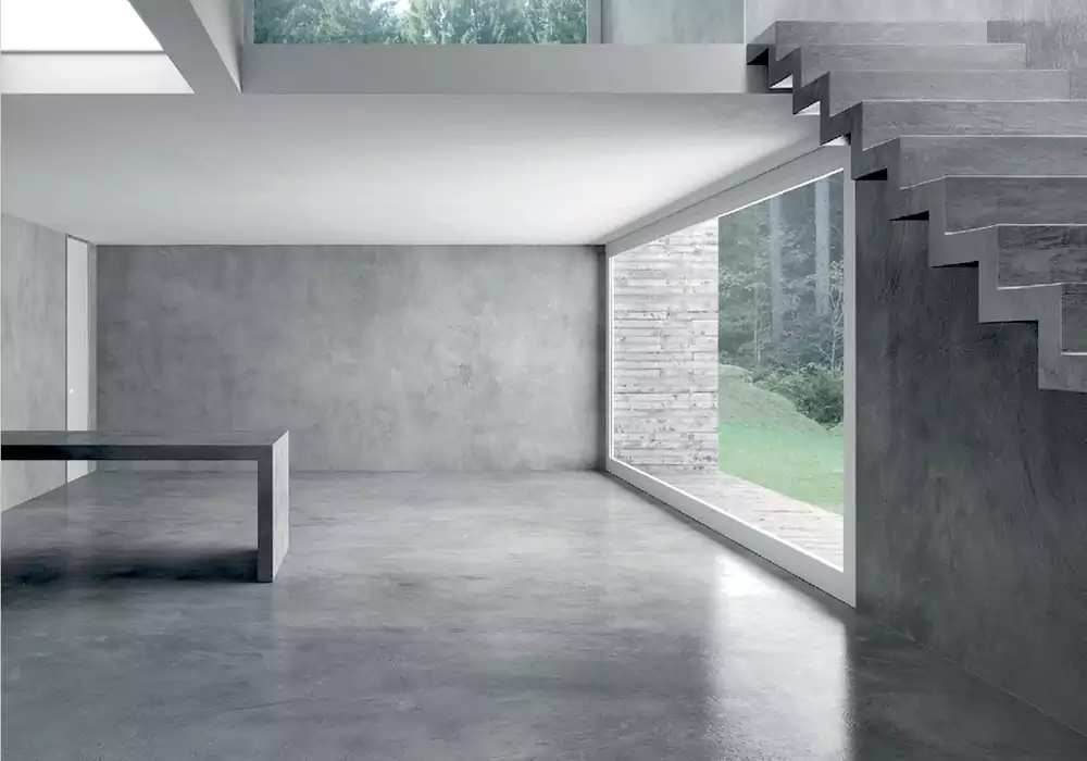 فضای اداری یا کافی‌شاپ با کف میکروسمنت درشت